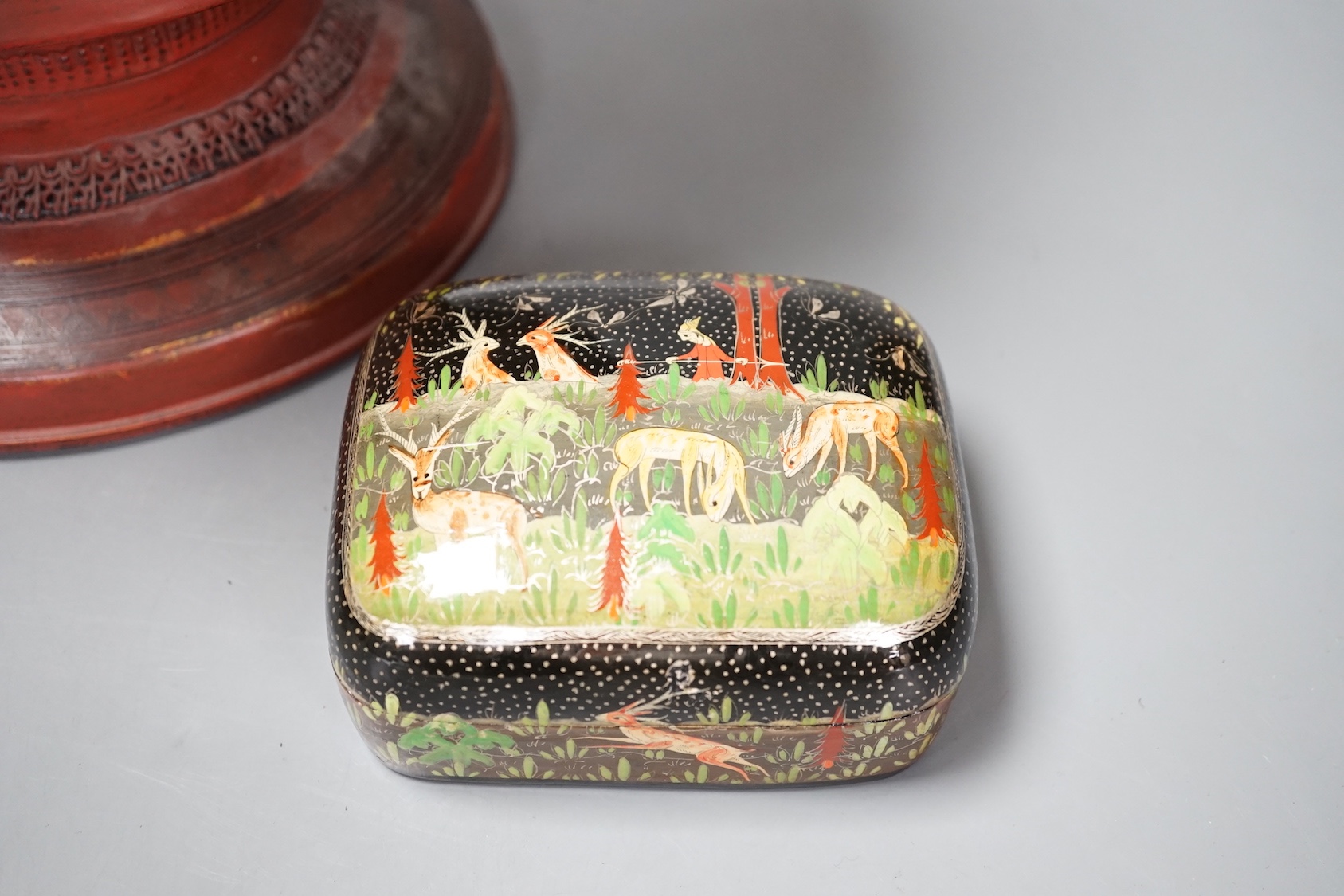 A Burmese lacquer box and cover, and a Persian lacquer box, tallest 41cm